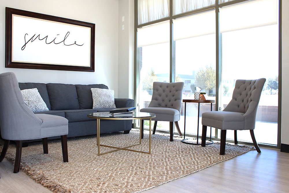 exceptional dentistry waiting area with several couches